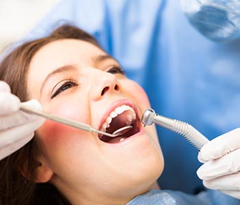 Preventive Dental Care Waterloo ON A man showing his healthy teeth
